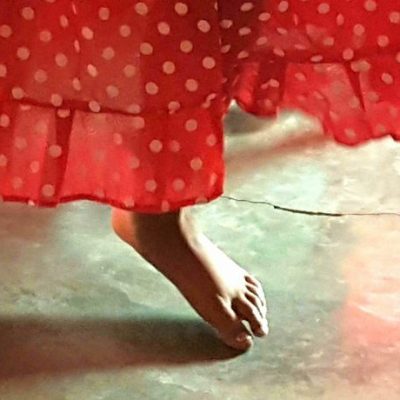 A closeup of a girl's feet, while she dances