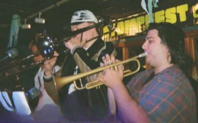 los freakies with trumpet, trombone and guitar players visible